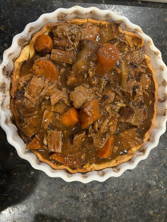 Fork tender brisket and mushroom pie